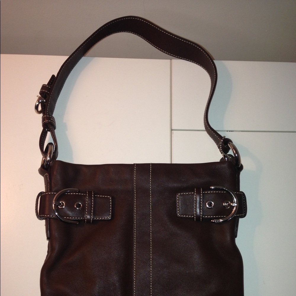 Brown Coach leather bag.